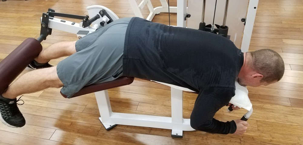 Leg curls are great core exercises for back pain